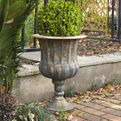 Worth Garden antique iron urn with weathered texture for porches.