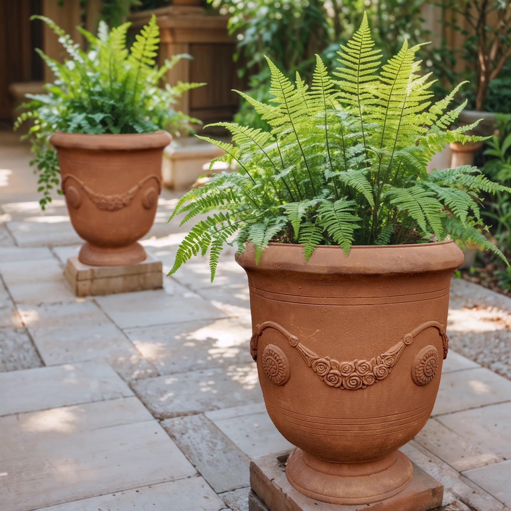 Worth Garden Urn Planter built-in drainage hole supports healthy roots for outdoor plants.