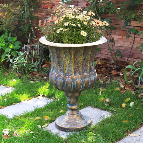 Worth Garden urn planter pair creates symmetrical garden accent.