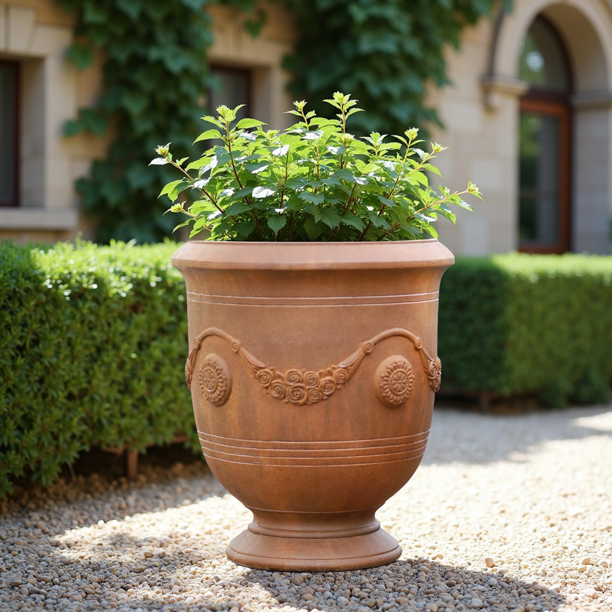 Worth Garden Urn Planter elegant urn silhouette elevates porches, patios, and entryways.