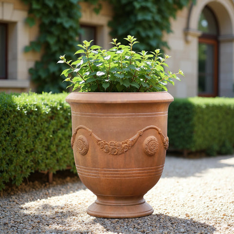 Worth Garden Urn Planter elegant urn silhouette elevates porches, patios, and entryways.