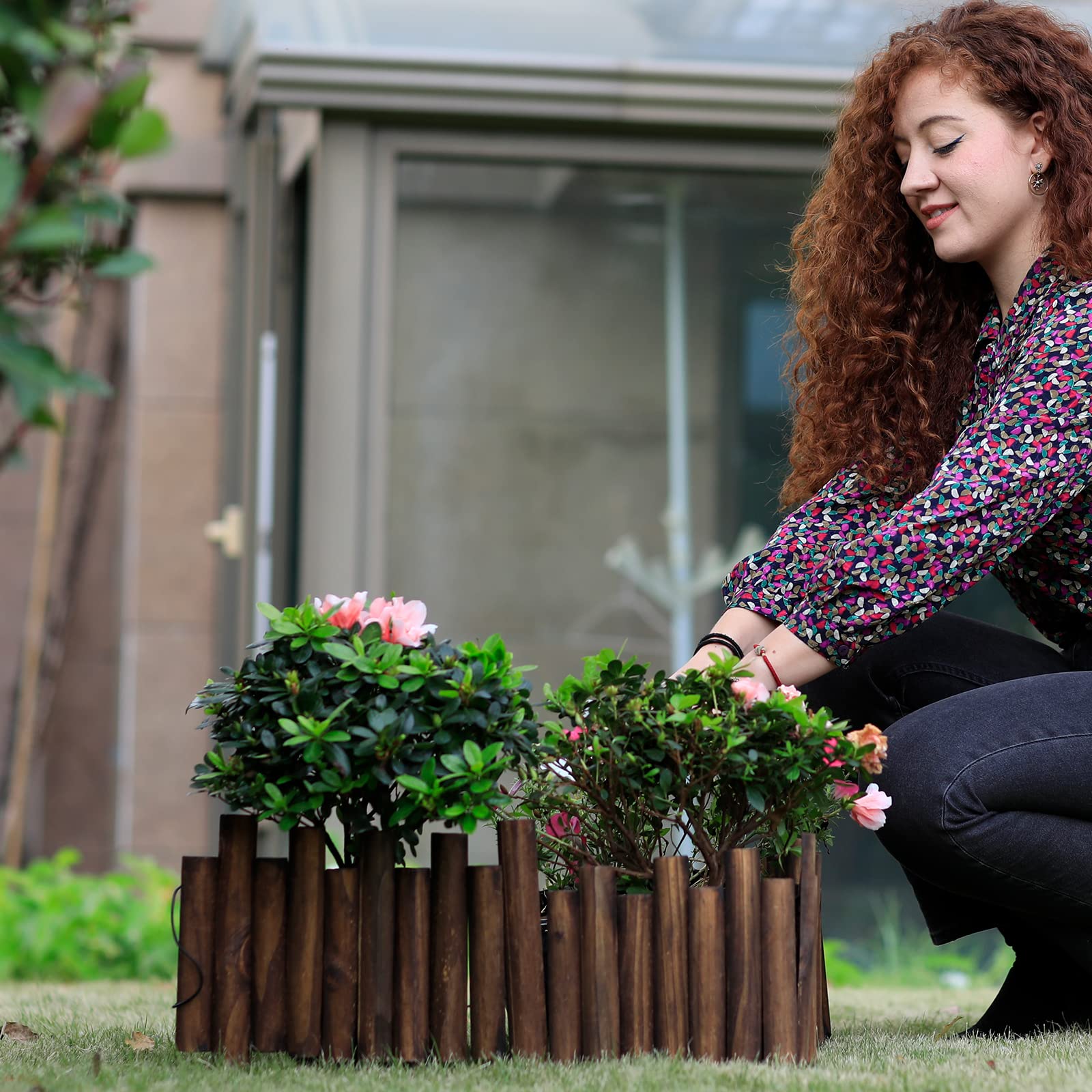 Worth Garden fence surrounds a tree while keeping mulch contained.