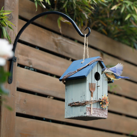 Worth Garden wrought-iron hook hardware complements rustic settings with reliable mounting.