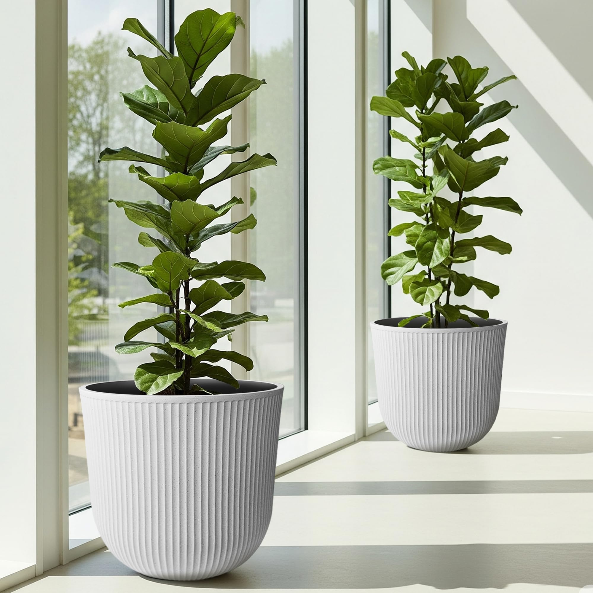 Worth planter set in white highlights durable plastic and outdoor versatility.