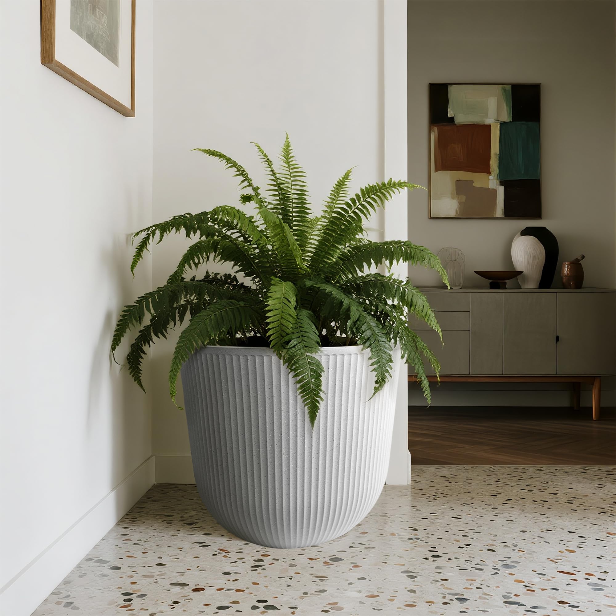 Worth planters placed on a balcony showing weather-resistant design.