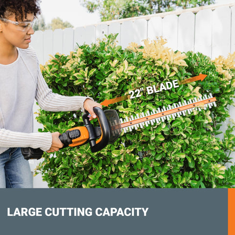 WORX WG931 pivoting-head trimmer reaching slopes and tight corners