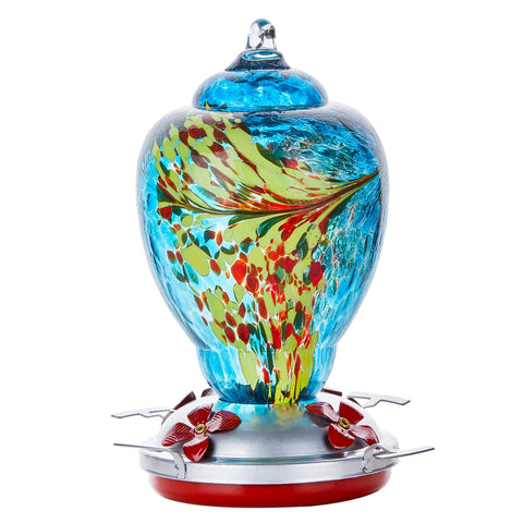 WOSIBO blue glass hummingbird feeder hangs in the garden, attracting more birds.