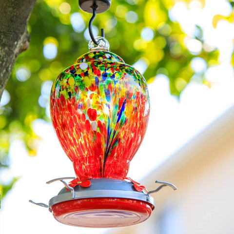 WOSIBO hand blown glass hummingbird feeder showing artisanal bubbles