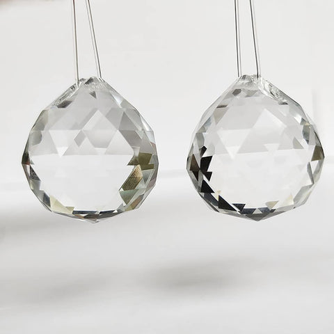 wowoda window suncatcher crystal ball captures sunlight into vibrant rainbows.
