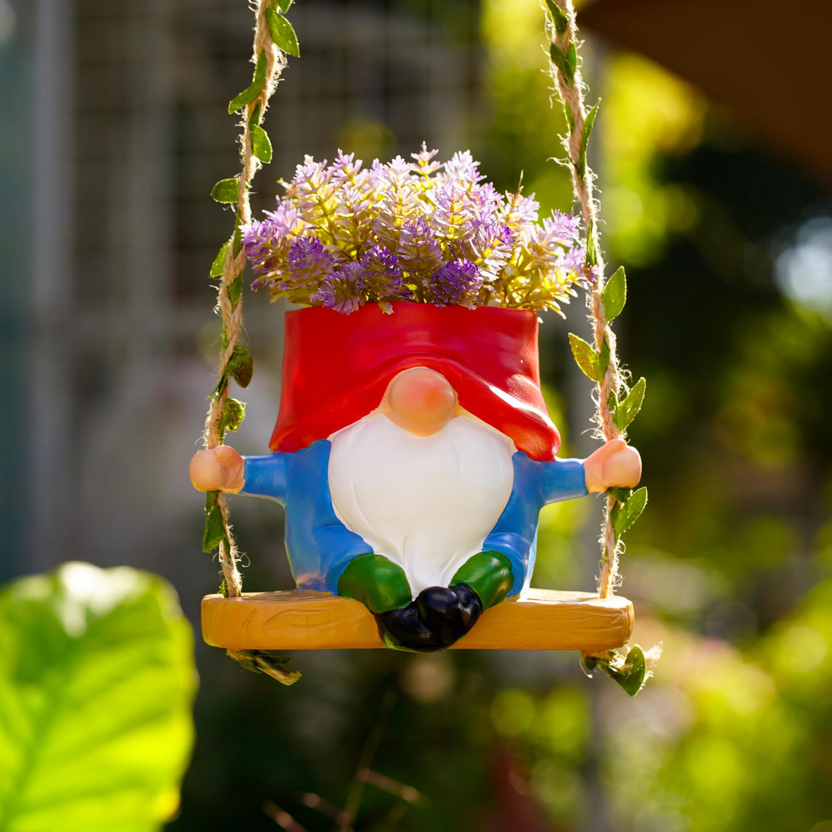 WSHMZYHOME swing garden gnome planter on a patio for charming decor