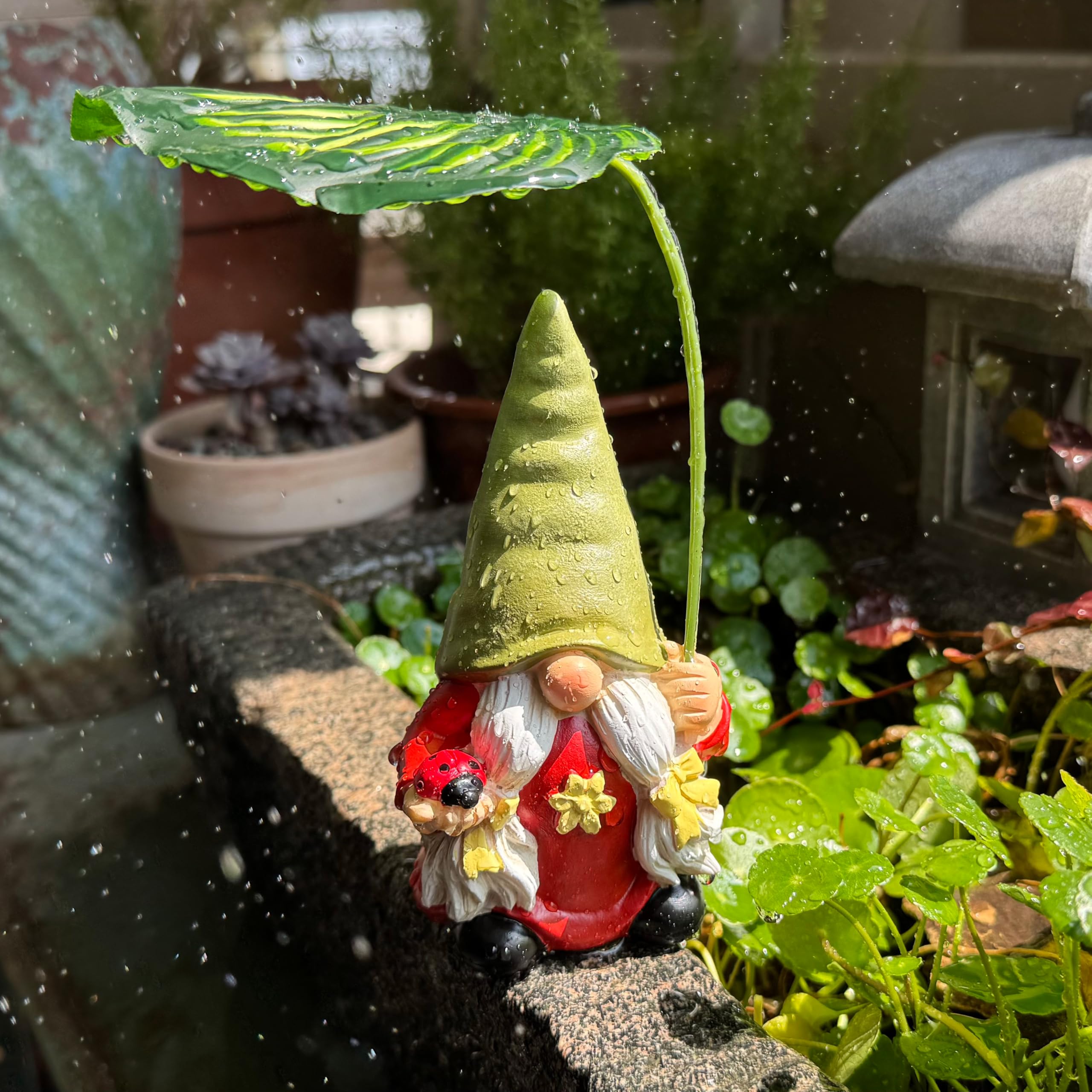 WSHMZYHOME gnome carries a tiny ladybug for whimsy on patios