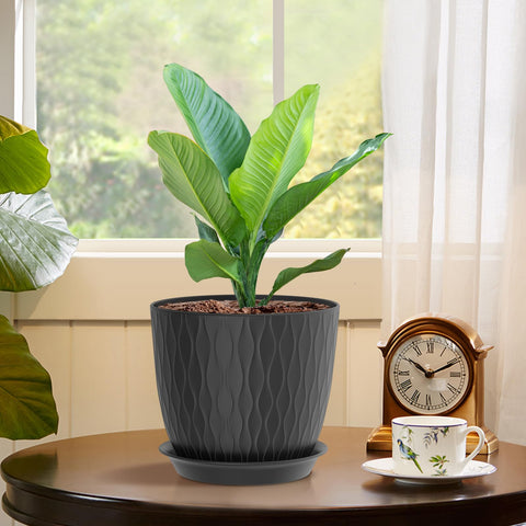 WSMKSZ ripple pot with saucer keeps surfaces clean while displaying plants.