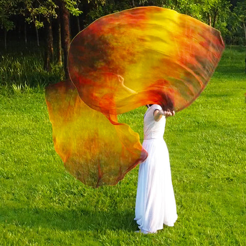 Wuchieal color guard flags in group performances for dramatic visual impact.