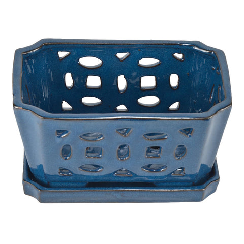 W&W orchid pot blue with drainage holes demonstrates water control for roots.
