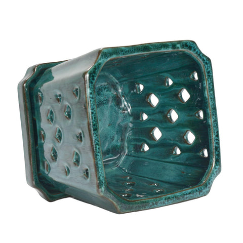 Durable ceramic construction of the W&amp;W orchid pot for lasting use.
