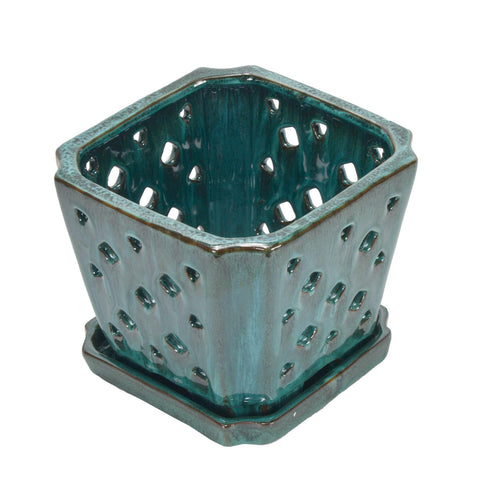 W&amp;W orchid pot glazed finish in green adds decorative appeal.