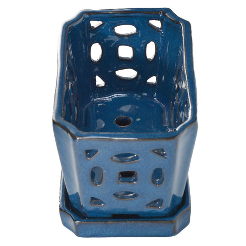 W&W orchid pot blue saucer highlights runoff collection and surface protection.