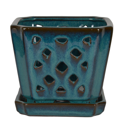 W&W Orchid Pot teal holes close-up highlighting drainage capability