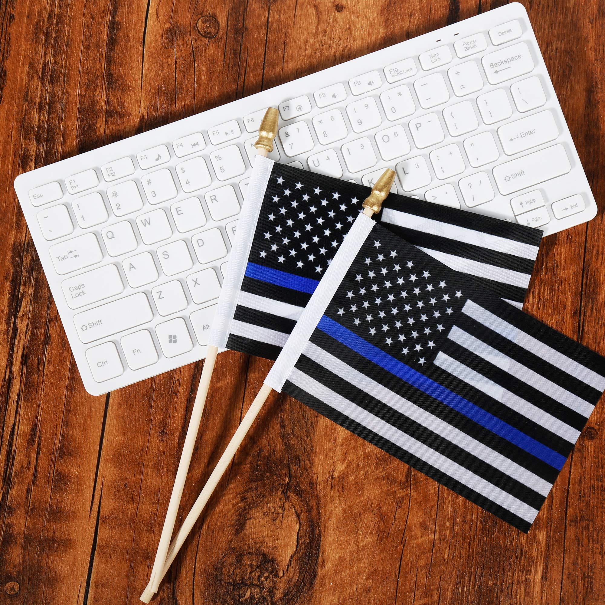XCFH Thin Blue Line flag with golden spear top for premium event display.