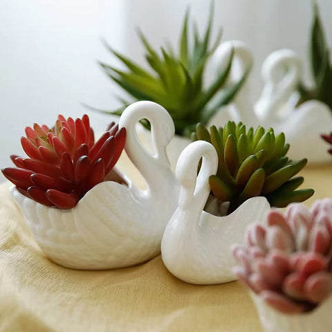 XESAGSNV Elegant indoor-outdoor decor with modern swan design.