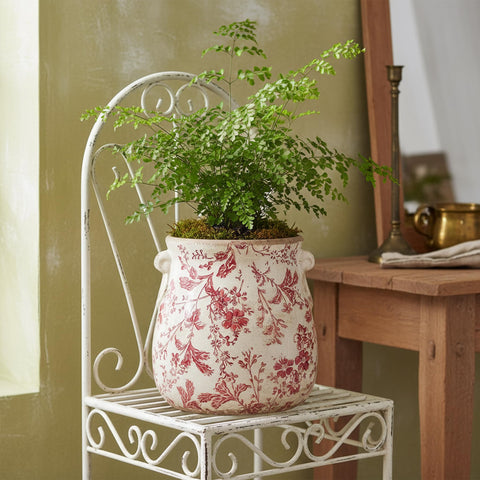 Xiaan Jiaju red planter close-up shows texture and vintage glaze detail.