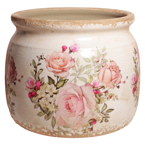 Xiaan Jiaju pink ceramic planter with rose pattern and crackle glaze for vibrant indoor greenery.