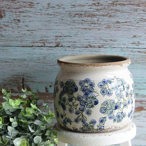 Xiaan Jiaju deep blue floral planter detail showcases craftsmanship.