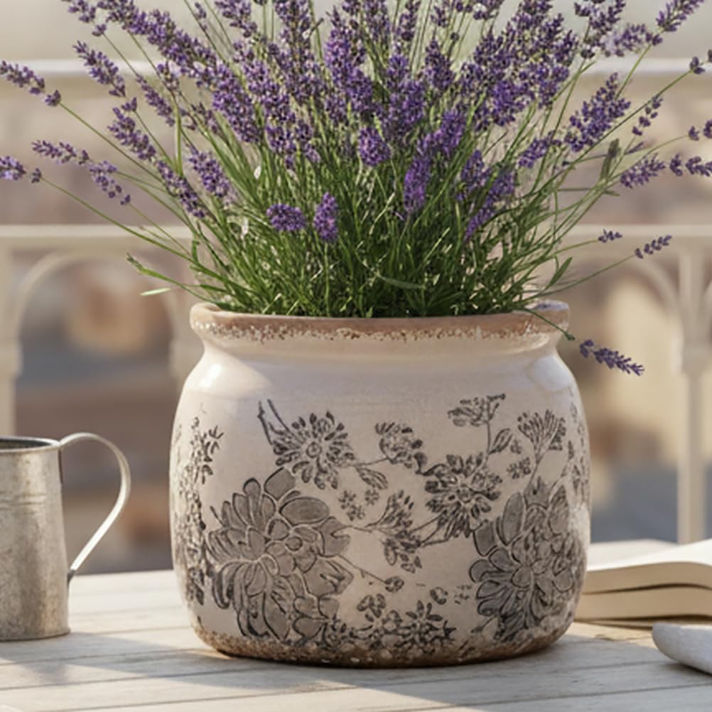 Xiaan Jiaju gray ceramic planter drainage hole close-up for healthy watering