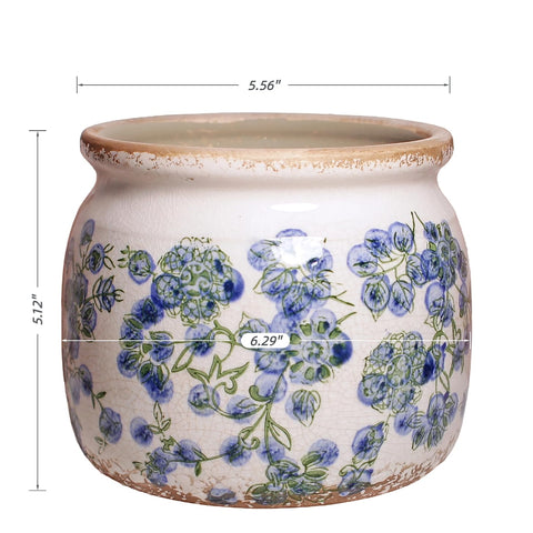 Xiaan Jiaju vintage crackle glaze planter adds rustic charm to rooms.