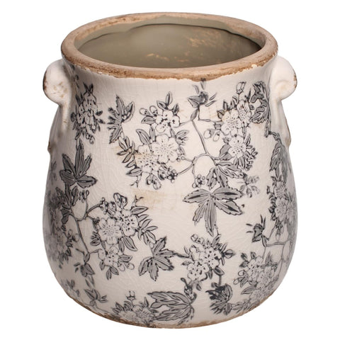 Xiaan Jiaju crackle glaze terracotta planter adds vintage charm to shelves.