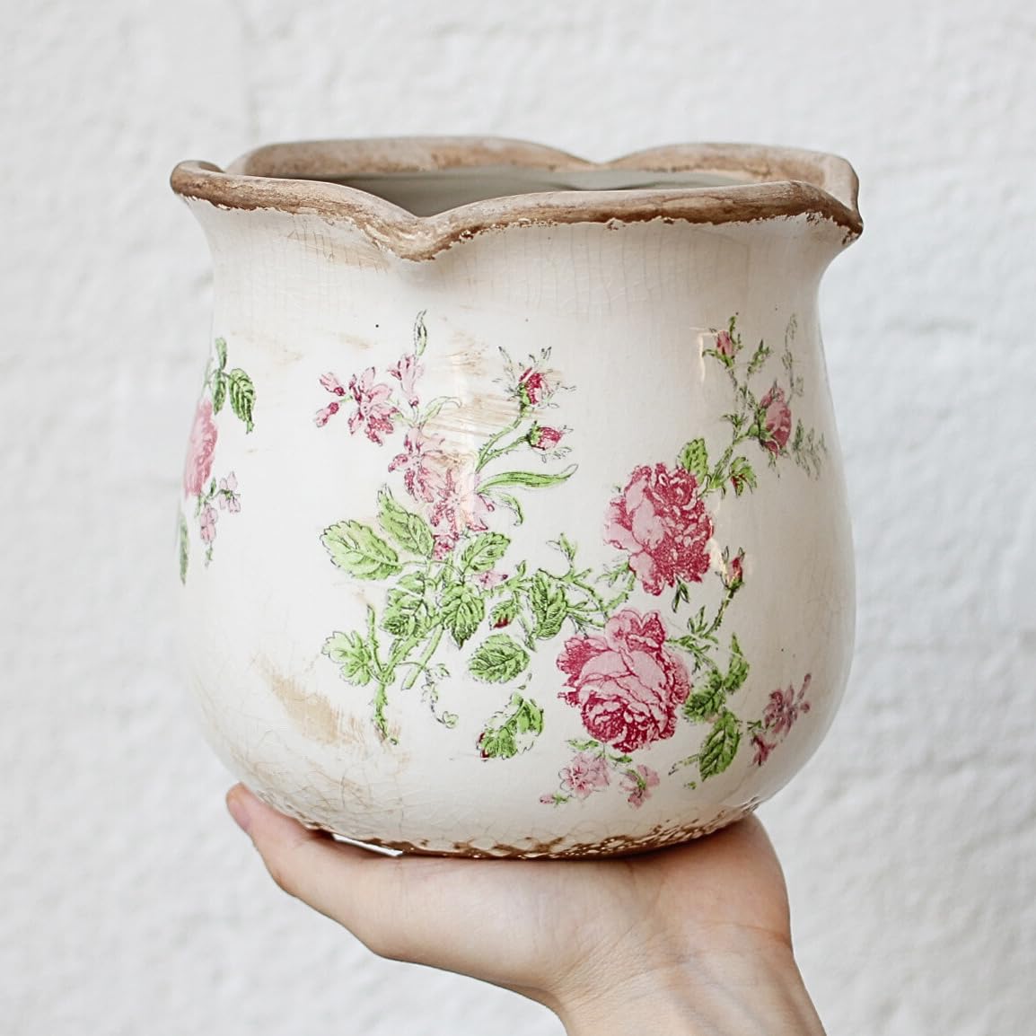 Xiaan Jiaju vintage distressed pattern pot adding rustic charm to any room