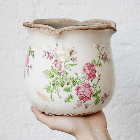 Xiaan Jiaju vintage distressed pattern pot adding rustic charm to any room