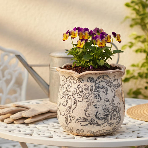 Xiaan Jiaju vintage planter with drainage hole supports healthy indoor plant roots.