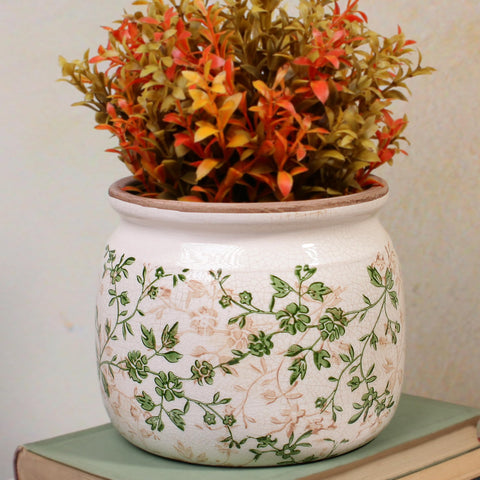 Xiaan Jiaju vase and planter arranged on a sunlit window sill display.