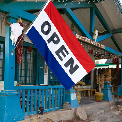 XIFAN storefront flag in action attracts attention and invites customers inside.