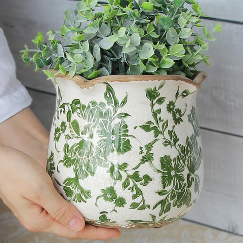 Xiaan Jiaju distressed-pattern planter brings warm, shabby-chic style indoors