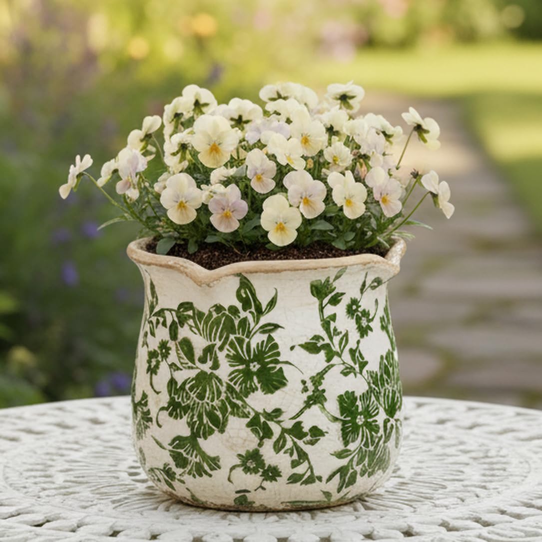 Xiaan Jiaju vintage planter with green scroll adds rustic charm to homes