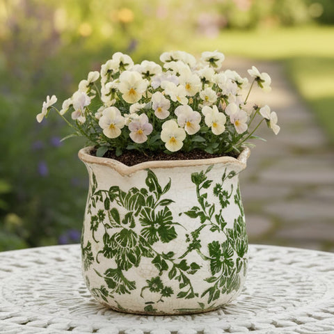 Xiaan Jiaju vintage planter with green scroll adds rustic charm to homes