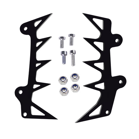 XTPTFABS spikes in use on a chainsaw suggest practical mounting.