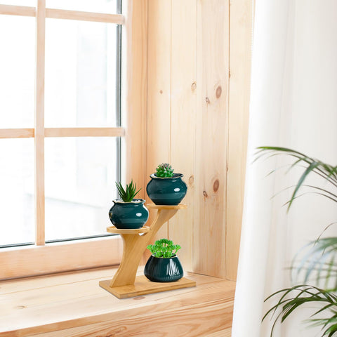 XXXFLOWER Bamboo Plant Stand 3-Tier holds tiny succulents on three trays.