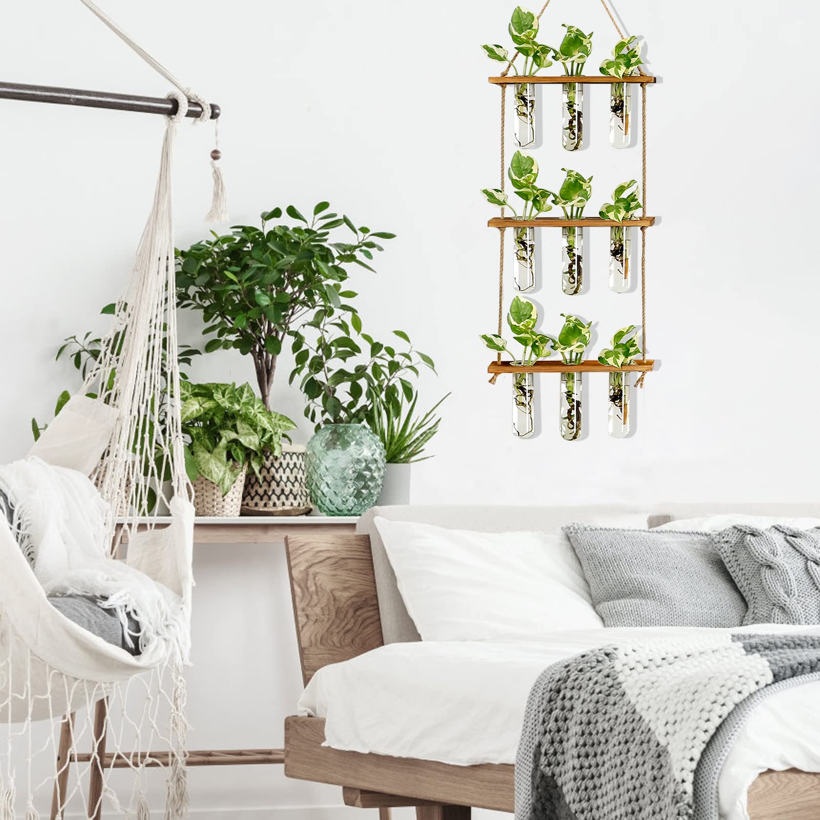 XXXFLOWER tiered plant display maximizes small-space décor with multiple tube planters.