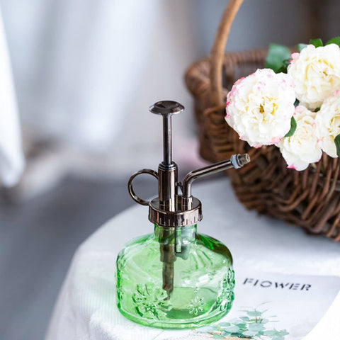 XXXFLOWER transparent glass watering bottle keeps you in control while watering gently.