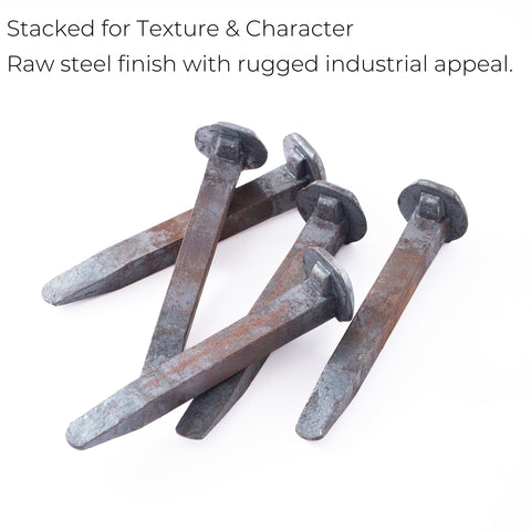 Xylarnoveth railroad spikes in hammering action, showing momentum and control.