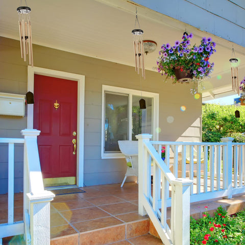 Yahenda wind chimes hanging on window or tree for ambient sound.