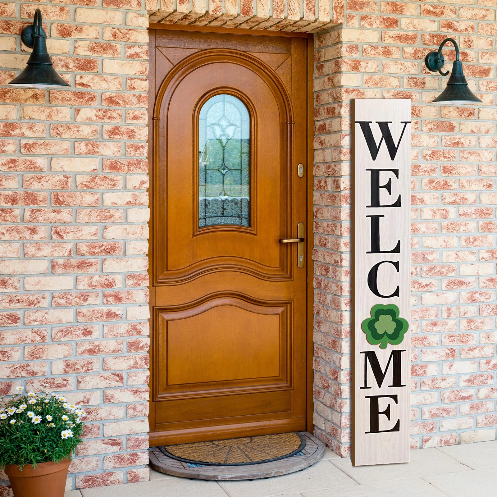 Yalikop welcome sign wood panel closeup highlighting craftsmanship.