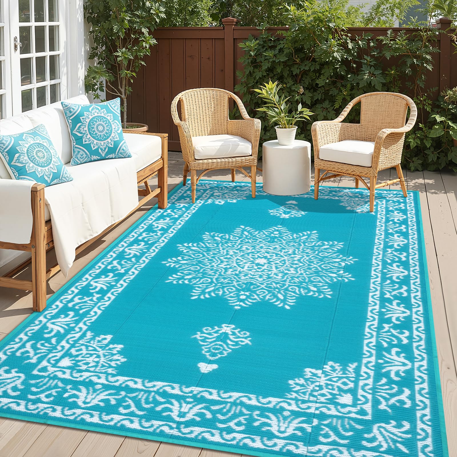 Yamaziot 6x9 ft teal boho outdoor rug on patio adds stylish color and texture