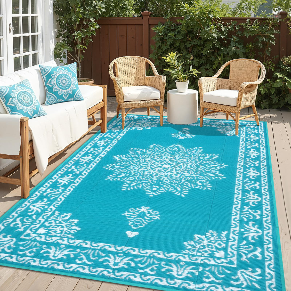 Yamaziot 6x9 ft teal boho outdoor rug on patio adds stylish color and texture