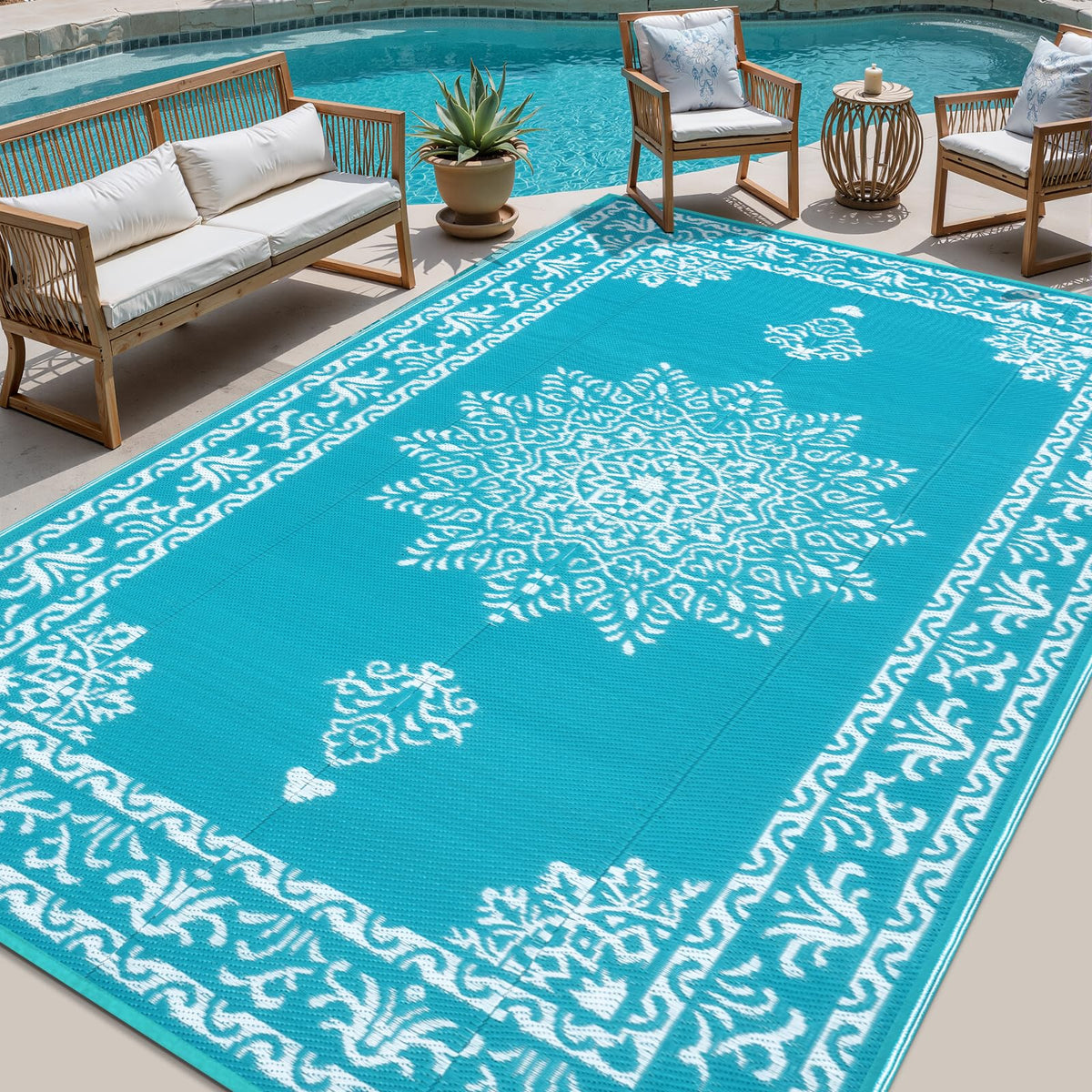 Yamaziot outdoor rug 8x10 teal boho front view creates inviting patio ambience.