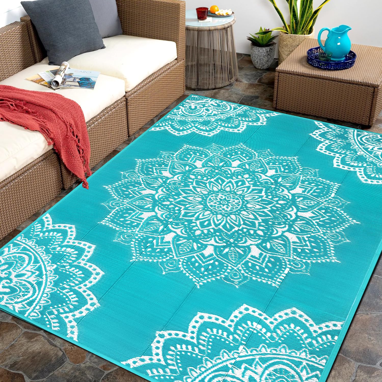 Yamaziot waterproof outdoor rug 5x8 blue on patio for durable outdoor comfort.