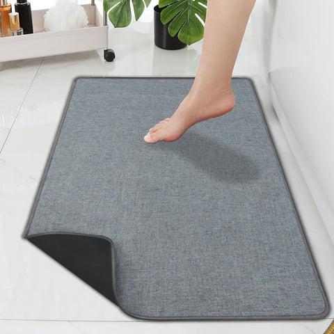 Yancorp ultra-thin bath rug under door for seamless placement and space-saving coverage.